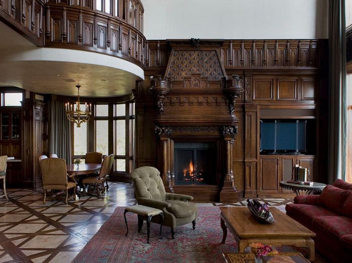Деревянная мебель с резными узорами в готической гостиной
